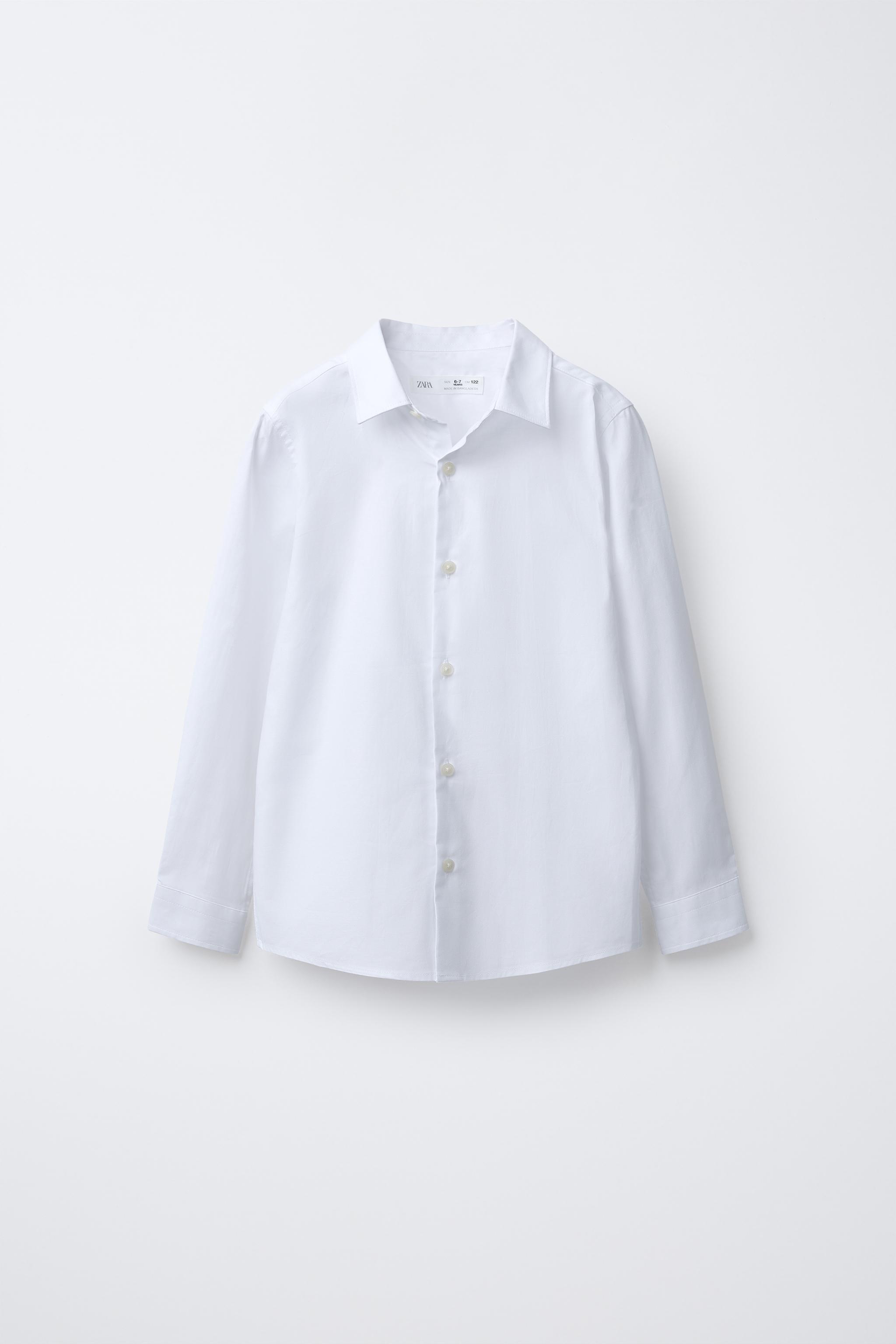 CHEMISE UNIE HABILLÉE